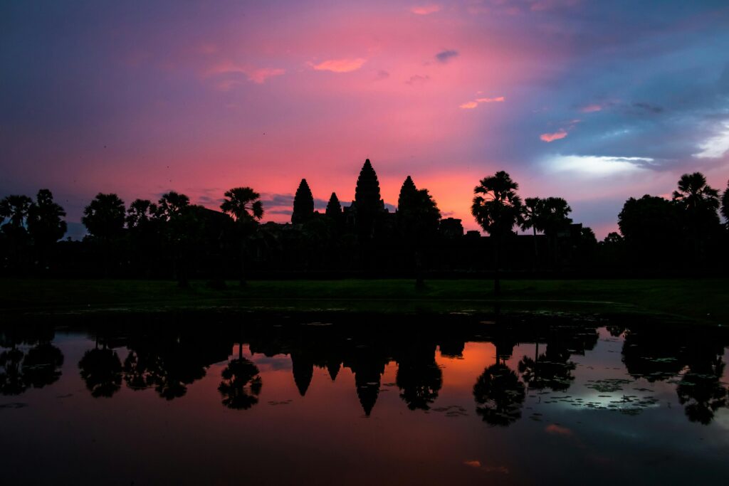 “Golden Reflections: Sunset Boat and Cycling Tour in the Floating Village by Siem Reaper”